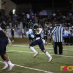 Guam High Panthers Ruben Ramirez sees an opening on his right side and takes off running.(photo by Bout It Productions)