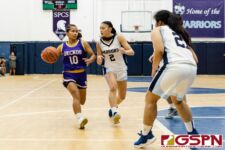 GW Gecko Aubri Chargualaf drives the ball into the paint for two points early in the first quarter of the game. (Photo by Michael Blas)