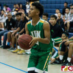 JFK Islanders Jeremiah Kintoki finds his sweet spot behind the three point line. (Photo by Michael Blas)