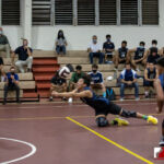 Harvest Eagle Seung Chan Lee dives for the ball against the FD Friars. ( Photo by Bout It Productions )