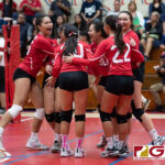 St. John's Knights celebrate as they continue their streak in the third set. (Photo by Michael Blas)