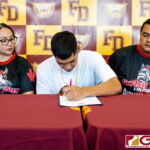 Aidan McDonald Signs his letter of intent to play D1 Volleyball with the Grand View Vikings. (Photo by Michael Blas)