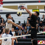 Tiyan Titans Neil Ericsson connects with an attack block against Harvest Eagles Michael Choi. (Photo by Michael Blas)