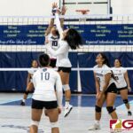 Academy Cougar Talen Topasna tips as Warrior Janniliese Quintanilla contests. (Photo by Michael Blas)