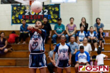 St. Anthony Raider Hinengi San Nicolas bumps the ball in the closing minutes of the first set. (Photo by Michael Blas)