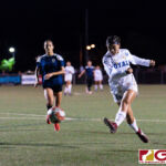 ND Royals Lauren Phillips takes a shot a goal in the first half of the game. (Photo by Michael Blas)