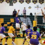 GW Gecko Laurence Melencio powers the ball to the awaiting JFK defenders. Photo by Bout It Productions