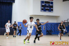 Harvest Eagles JV Jirah Padilla looks to get past ND Royals JV Ely Pocaigue. ( Photo by Bout It Productions )