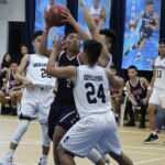 Bulldog JT Lorena makes his move in the post for two points in the second half. (photo by Robert Balajadia)