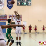 Okkodo Bulldogs Kevin Cabral shoots from the outside early in the first half. (Photo by Michael Blas)