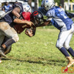 Faha Outlaws Zavier Camacho runs short of the goaline after being taken down by the Southern Cowboys defense. (photo by Bout It Productions)