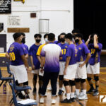 The GW Geckos take a timeout to talk things over after the Tiyan Titans keep it a tight game. Photo by Bout It Productions
