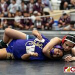 Academy Cougars Lauren Lujan defeated GW Geckos Aveah Garrido to get gold in the 122 pound division. (Photo by Michael Blas)