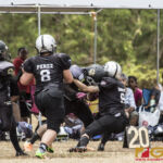 The Sindalu Raiders and SB Saints hit the gridiron in the opening week of the 2019 GWFTL Season. (photo by Bout It Productions)