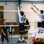 Jose Rios Voyagers Michael Quinata makes a block against Untalan Wildcats Kooper Mesa. (Photo by Michael Blas)