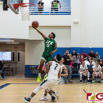 JFK Islanders Jerry Ngraremiang with the layup on the fast break after stealing the ball. (Photo by Michael Blas)
