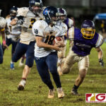 Guam High Panthers Drew Mestas strips the ball off of GW Geckos Shelby Meeks and looks to gain yardage on the play. (Photo by Michael Blas)
