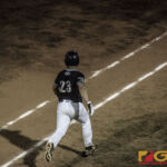 IT&E Rays Justin Candoleta looks outfield after taking a swing at bat. (photo by Bout It Productions)