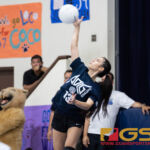 AOLG Cougar's Alexandria Lekites serves early on in the IIAAG girls varsity volleyball game against the George Washington Geckos. (Photo by Michael Blas)