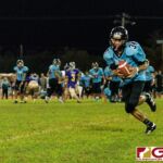 Southern Dolphin Cerilo Reyes completes the catch for a huge gain on the play. (Photo by Michael Blas)