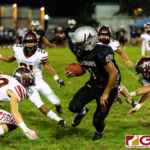 Sanchez Shark John Salas gets swarmed by the Friars special team on the kick return. (Photo by Michael Blas)