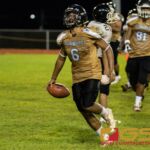 JFK Islander's Justin Camacho celebrates after scoring a touchdown early in the third quarter. (Photo by Michael Blas)
