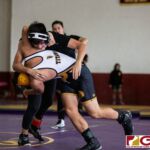 High School wrestlers hit the mats in a Preseason Tournament held at the FD Jungle. (photo by Bout It Productions.)