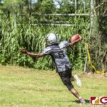 Guam Raiders Aiden Palacios celebrates after adding up points on the board. (photo by Bout It Productions)