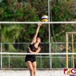 Hallie Wigsten looks for the kill shot in the second set of the finals matchup against Kristen Serrano and Yasmin Lopez. (Photo by Michael Blas)