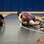 Father Duenas Friars Matias Calvo pins Guam High Panthers Julio Rosas in the 195 pound division of the 2018 IIAAG high school boys wrestling match. (Photo by Michael Blas)