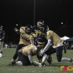 GW Geckos Dominador Jamanila II pushes his way through the Panthers defense. (photo by Bout It Productions)