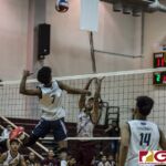 Harvest Eagles Alan Thomas gets ready to slam one over the net against his defender. (photo by Bout It Productions)