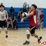 St. John's Knights Kian Malakooti connects with a bump off a Harvest Eagle serve. (Photo by Michael Blas)