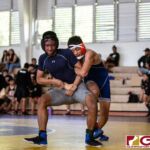 High School wrestlers hit the mats in a Preseason Tournament held at the FD Jungle. (photo by Bout It Productions.)