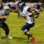 The Guam High Panthers Jalen Thach attempts to get past Simon Sanchez Sharks Patrick Salas. (Photo by Michael Blas)