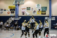 The Tiyan High Titans celebrate after leading by two sets over the Okkodo Bulldogs. Photo by Bout It Productions