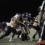 GW Geckos Keanu Gray protects the ball while getting through the defense for the score. (photo by Bout It Productions)