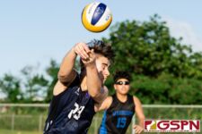 St. Paul Warrior Christian Hoteling keeps the saves the ball from going out of bounds. (Photo by Michael Blas)