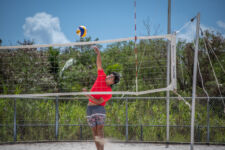 The St. John's Knights took on FD's Gold Team Saturday in a busy day of action at the GFA Sand Courts in Harmon. (photo by Raine Delos Reyes)