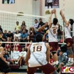 FD Friars Brandon Soriano blocks an attack from Bulldogs Jessie Martin towards the end of the third set. (Photo by Michael Blas)