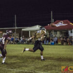 JFK's Juan Sarmiento hustles down field only to meet an overthrown ball by his quarterback (photo by Michael Ebio)