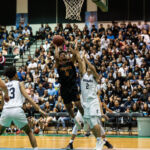 FD Friars Tony Quinene gets past St. Paul Warriors Nich Fermin for a shot at the basket. (Photo by Michael Blas)