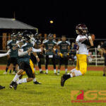 FD Friar's Evan Brown makes an interception late in the first half of the game. (Photo By Michael Blas)
