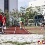 This Friday's IIAAG Track & Field Meet moves to the ocean scenery of J.F.K High. The sweltering heat was on but the fans and athletes still put on a show. (photo by Bout It Productions)