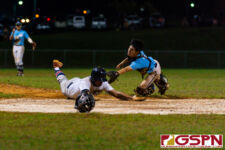 GW Gecko Franklin Ninete slides into home plate before ND Royal Zavier Panes can make the tag. (Photo by Michael Blas)