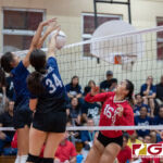 AOLG Cougars Laressa Halladay and Isabella Bargfrede connect with a block on St. John's Knights Angeline Del Carmen. (Photo by Michael Blas)