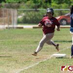 Islanders Pilar George clears third base and makes her way to home plate for a run in. (Photo by Michael Blas)
