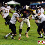 JFK Islander Nico Velez and Juan Sarmiento close in on Gecko Dominador Jamanilla II for a tackle. (Photo by Michael Blas)