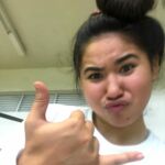 Carlie and her coaches have developed a strong enough relationship to where she likes to take selfies on her coaches phones. Over the 400 photos, her coaches hand picked their favorite ones. (photo courtesy of Mike Rabago)