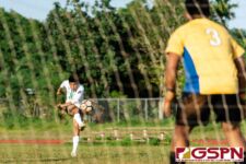 JFK Islander Justin Cruz attempts to score a goal in the first half of the game. (Photo by Michael Blas)